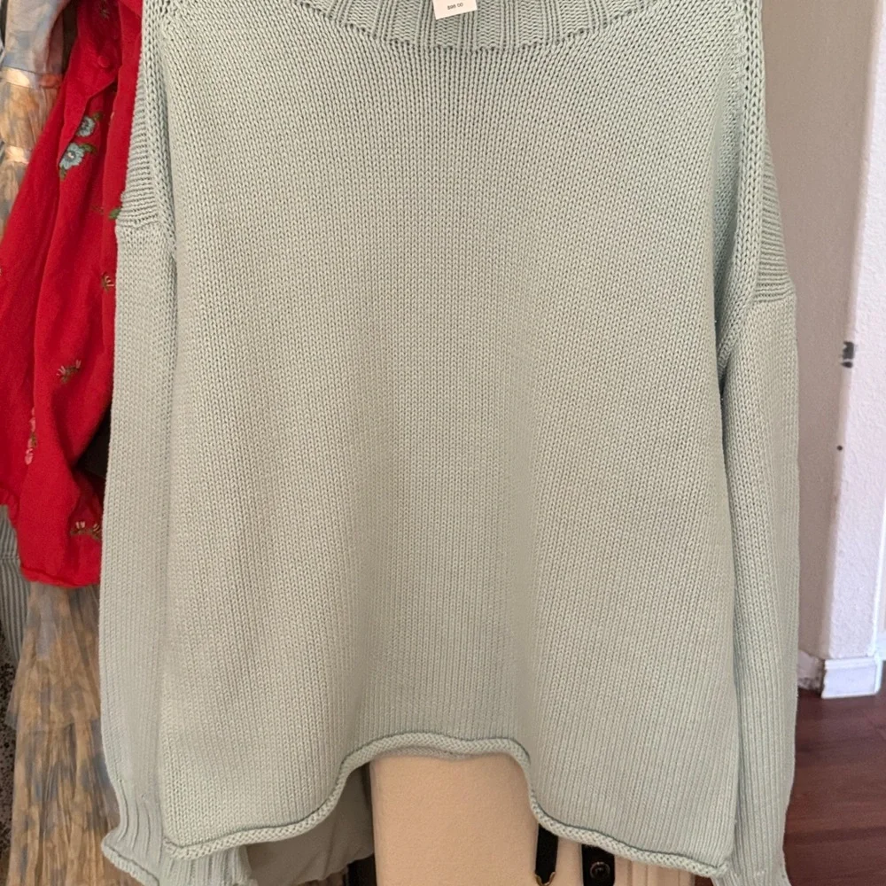 2025 Rollneck™ sweater in Sheer Blue
